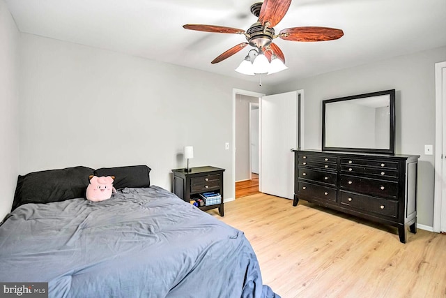 13059 Open Hearth Way, Germantown, MD 20874 - bedroom with baseboards, a ceiling fan, and wood finished floors
