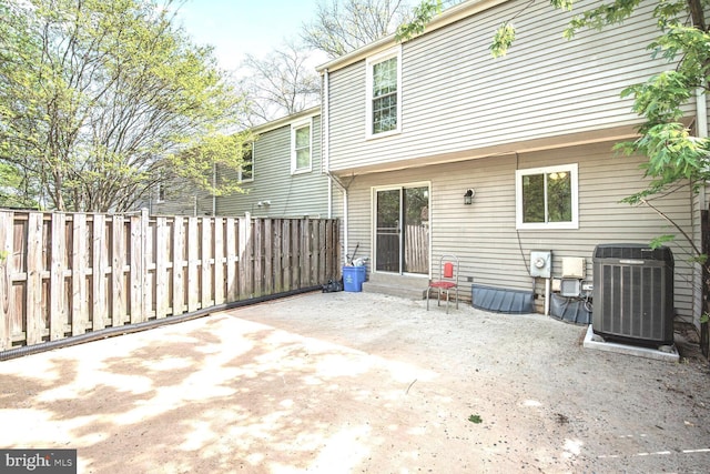 13059 Open Hearth Way, Germantown, MD 20874 - back of property featuring central AC, fence, and a patio area