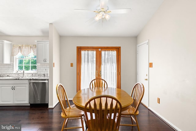 dining space featuring baseboards, dark wood-style flooring, ceiling fan, and french doors