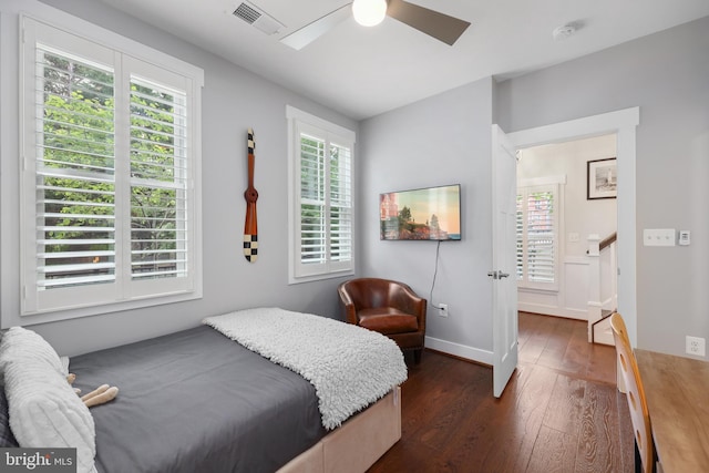 1353 Powhatan St, Alexandria, VA 22314 - bedroom with dark wood-style floors, multiple windows, ceiling fan, and baseboards