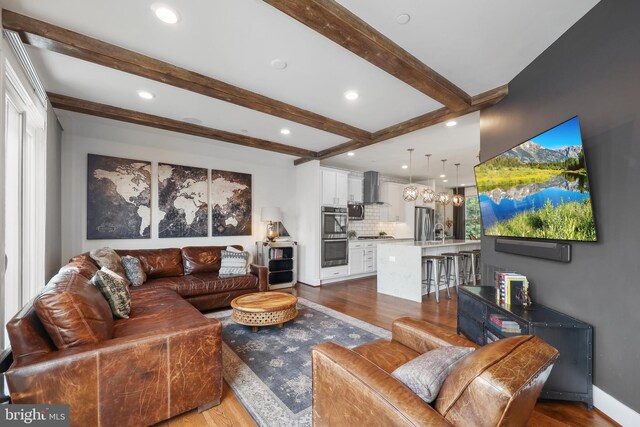 1353 Powhatan St, Alexandria, VA 22314 - living area featuring dark wood-type flooring, beamed ceiling, and recessed lighting
