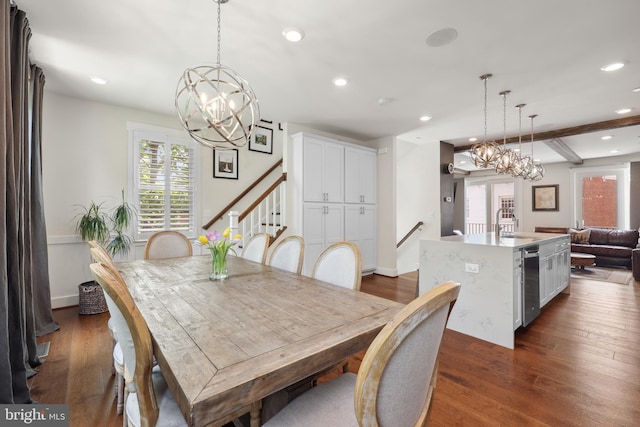 1353 Powhatan St, Alexandria, VA 22314 - dining area featuring a chandelier, dark wood finished floors, recessed lighting, and stairs