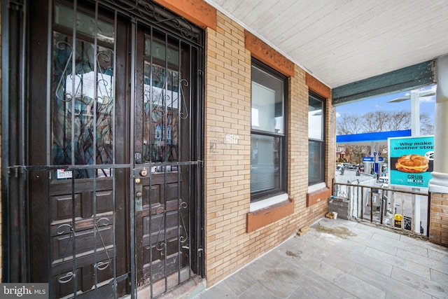 4517 Springfield Ave, Philadelphia, PA 19143 - view of exterior entry with covered porch and brick siding