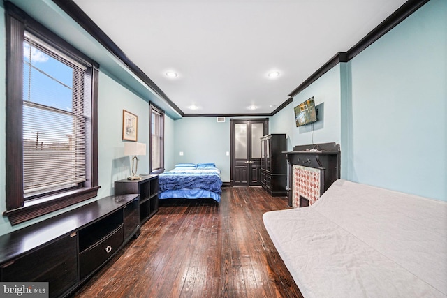 4517 Springfield Ave, Philadelphia, PA 19143 - bedroom featuring recessed lighting, dark wood-type flooring, visible vents, and ornamental molding