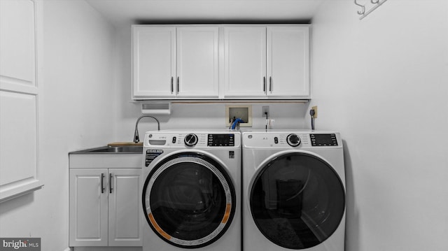 307 Homestead Rd, Hershey, PA 17033 - laundry area with a sink, washer and clothes dryer, and cabinet space