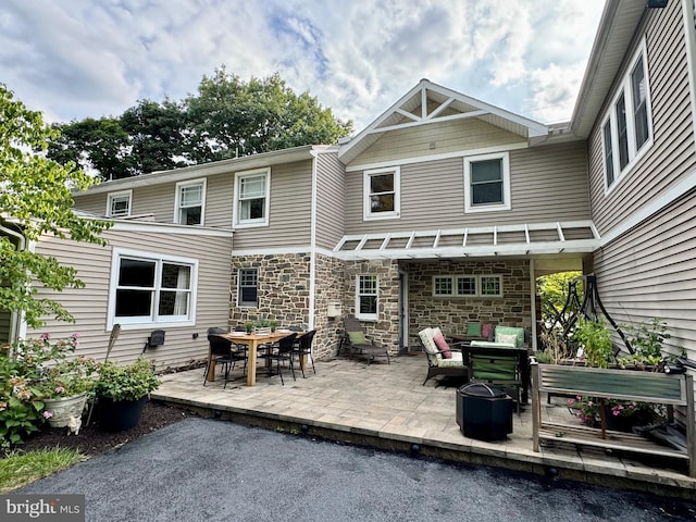 307 Homestead Rd, Hershey, PA 17033 - rear view of house featuring a patio area and stone siding