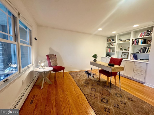 307 Homestead Rd, Hershey, PA 17033 - home office with a baseboard radiator, recessed lighting, visible vents, and light wood-type flooring