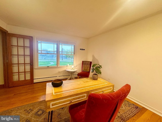 307 Homestead Rd, Hershey, PA 17033 - home office with baseboard heating, baseboards, and wood finished floors