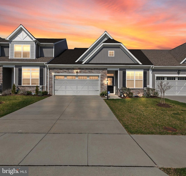 2537 Monarch Way, Bel Air, MD 21015 - view of front facade with stone siding, an attached garage, a yard, and concrete driveway