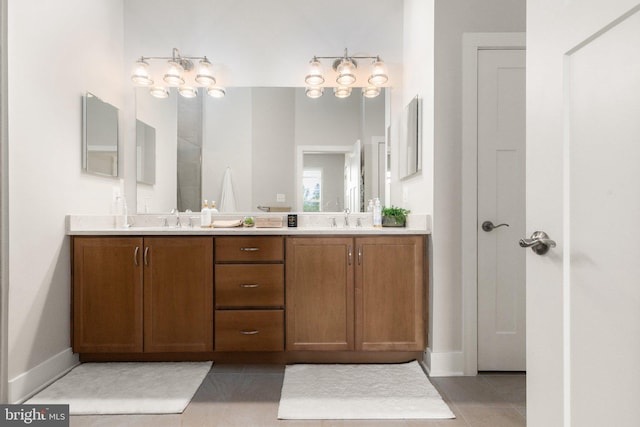 2537 Monarch Way, Bel Air, MD 21015 - bathroom featuring tile patterned floors, double vanity, and baseboards