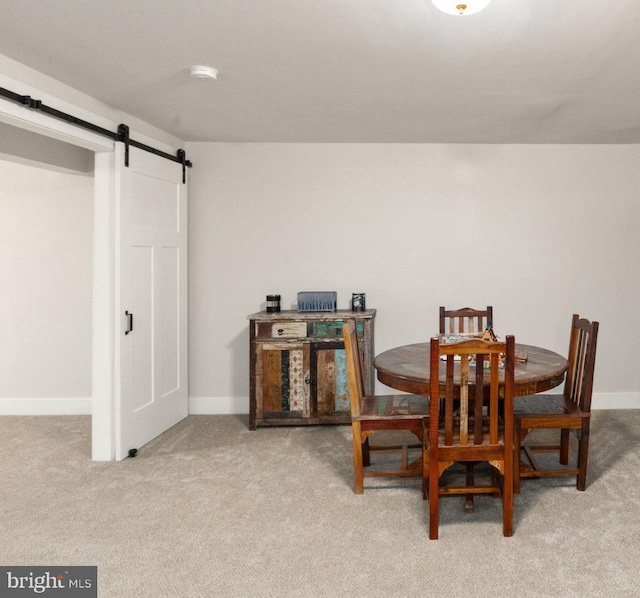 2537 Monarch Way, Bel Air, MD 21015 - carpeted dining area with a barn door and baseboards
