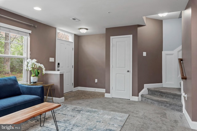 1614 Belle Dr, Annapolis, MD 21401 - foyer entrance with stairs, carpet flooring, visible vents, and baseboards
