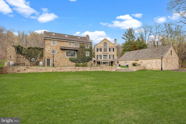6068 Stoney Hill Rd, New Hope, PA 18938 - rear view of property featuring a lawn