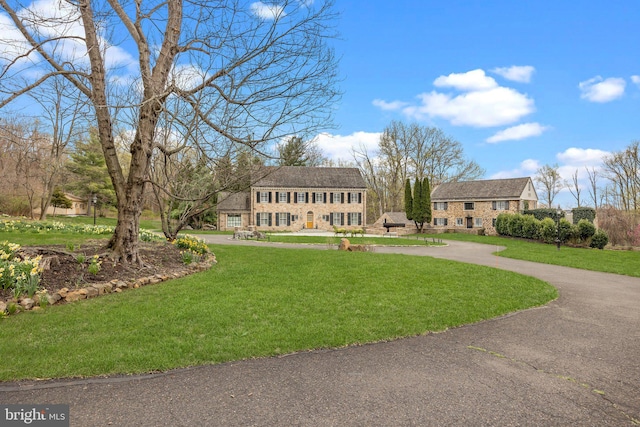 6068 Stoney Hill Rd, New Hope, PA 18938 - surrounding community with a yard and curved driveway