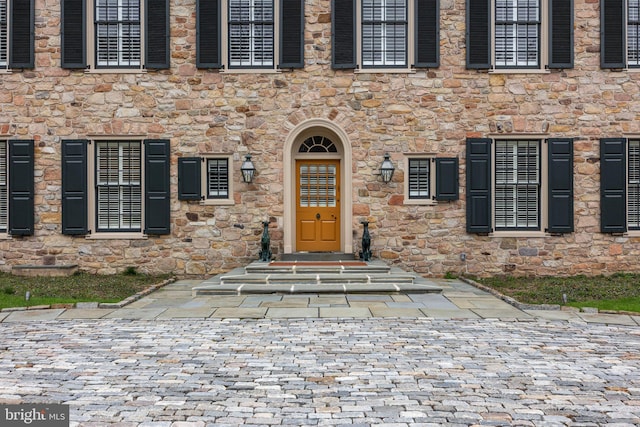 6068 Stoney Hill Rd, New Hope, PA 18938 - property entrance featuring stone siding
