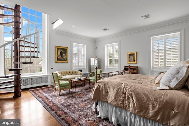 6068 Stoney Hill Rd, New Hope, PA 18938 - bedroom featuring wood finished floors, visible vents, and ornamental molding