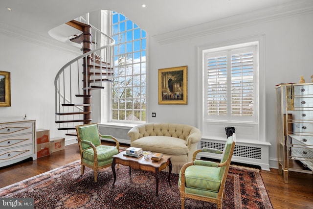 6068 Stoney Hill Rd, New Hope, PA 18938 - living area with radiator heating unit, stairs, wood finished floors, baseboards, and ornamental molding