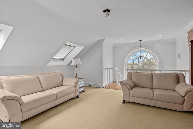 6068 Stoney Hill Rd, New Hope, PA 18938 - living room featuring crown molding, vaulted ceiling with skylight, baseboards, carpet flooring, and visible vents
