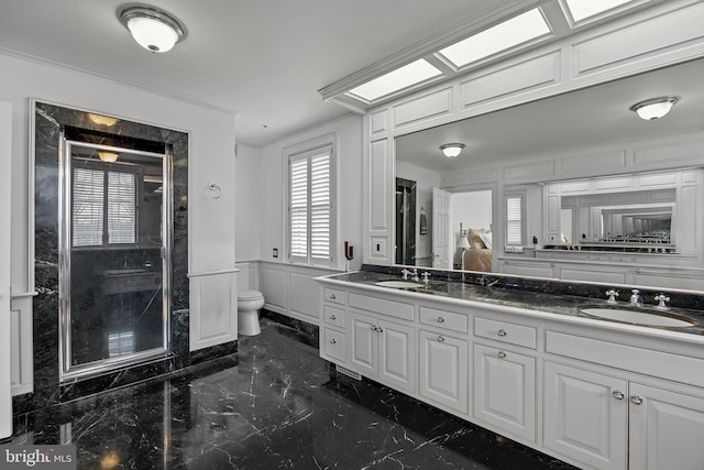 6068 Stoney Hill Rd, New Hope, PA 18938 - bathroom featuring marble finish floor, toilet, a sink, and double vanity