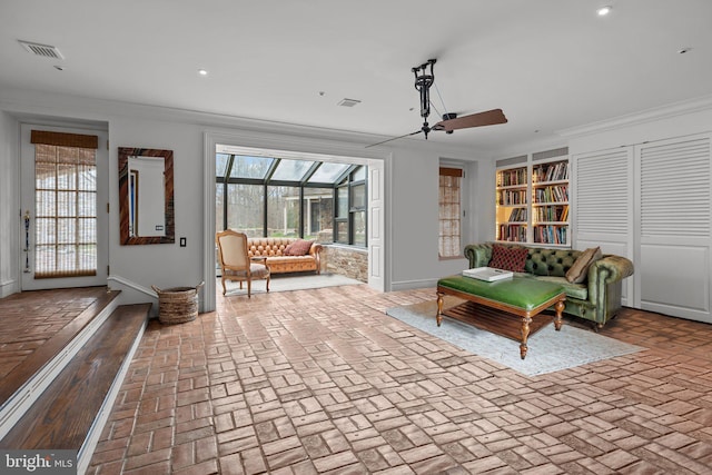 6068 Stoney Hill Rd, New Hope, PA 18938 - sitting room featuring brick floor, a ceiling fan, recessed lighting, and ornamental molding