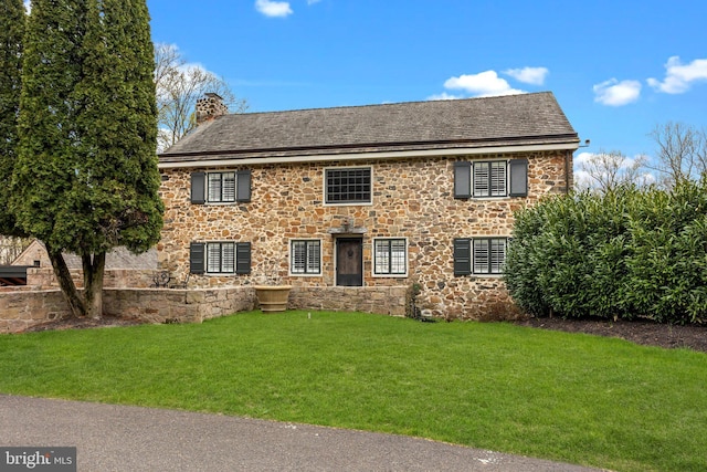 6068 Stoney Hill Rd, New Hope, PA 18938 - view of front of home with a chimney, stone siding, and a front yard