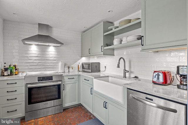 6068 Stoney Hill Rd, New Hope, PA 18938 - kitchen with wall chimney range hood, tasteful backsplash, open shelves, a sink, and appliances with stainless steel finishes