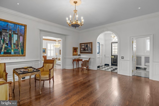 6068 Stoney Hill Rd, New Hope, PA 18938 - sitting room with an inviting chandelier, a decorative wall, and crown molding