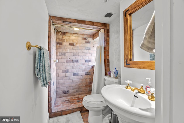 6068 Stoney Hill Rd, New Hope, PA 18938 - full bath featuring a shower stall, visible vents, toilet, and a sink
