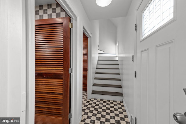 6068 Stoney Hill Rd, New Hope, PA 18938 - staircase featuring baseboards and tile patterned floors