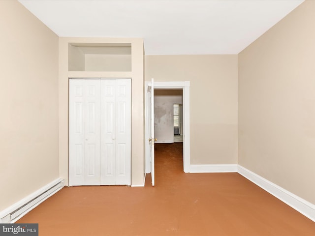 unfurnished bedroom featuring carpet floors, a closet, baseboards, and a baseboard radiator