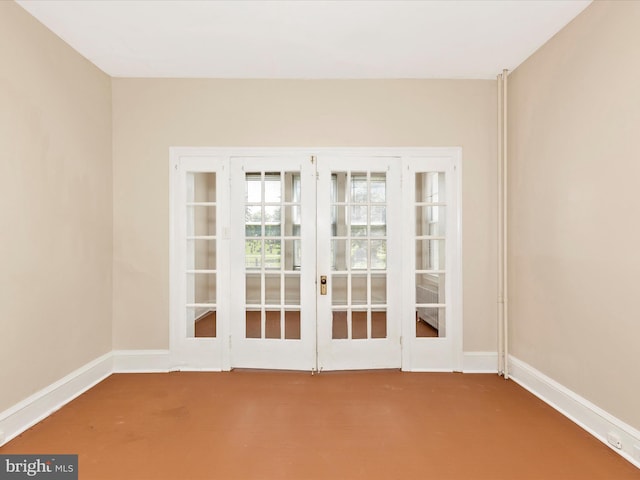 doorway to outside featuring carpet floors, baseboards, and french doors