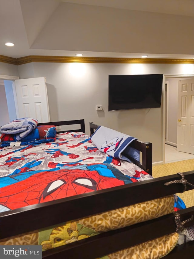 carpeted bedroom with crown molding and recessed lighting