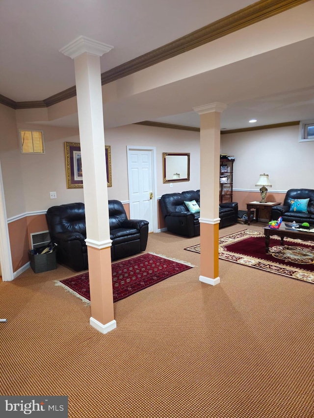 finished below grade area with carpet, baseboards, and ornamental molding