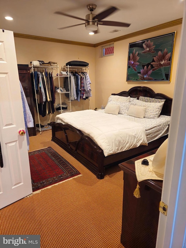 bedroom with recessed lighting, crown molding, carpet floors, visible vents, and ceiling fan