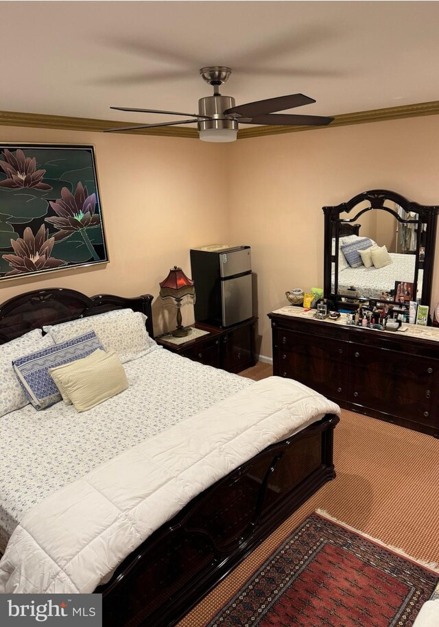 314 Senate Ct, Herndon, VA 20170 - bedroom featuring a ceiling fan, freestanding refrigerator, ornamental molding, and carpet