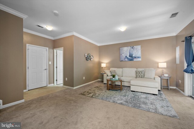 carpeted living room with crown molding and baseboards