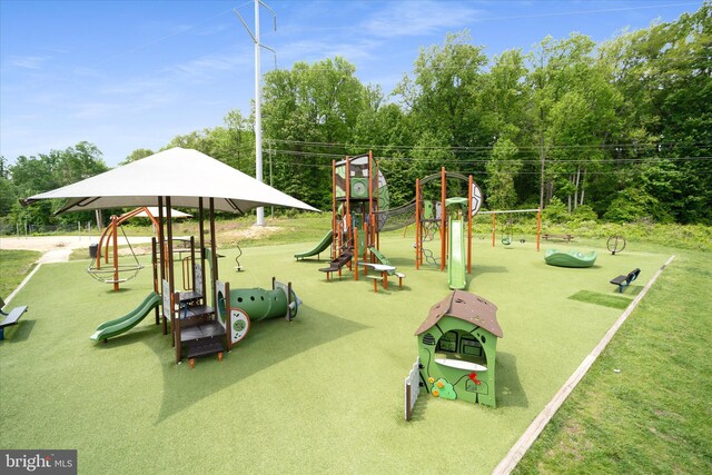 community play area with a yard