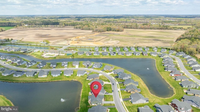 aerial view with a residential view and a water view