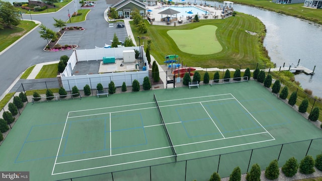 bird's eye view with golf course view and a water view