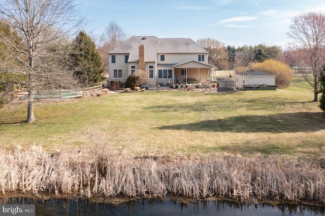 4358 Bergstrom Rd, Doylestown, PA 18902 - back of house with a water view and a patio