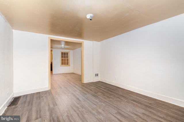 1228 Derry St, Harrisburg, PA 17104 - unfurnished room with visible vents, wood finished floors, and baseboards