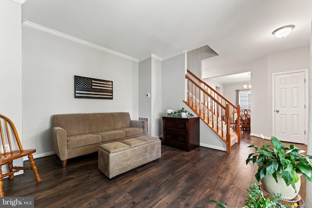 living area with ornamental molding, stairs, and dark wood-style floors