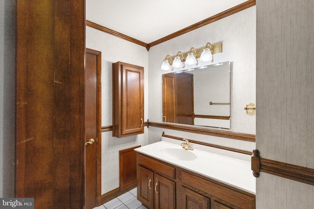 bathroom with tile patterned floors, ornamental molding, and vanity