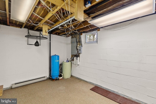 below grade area featuring electric panel and a baseboard heating unit