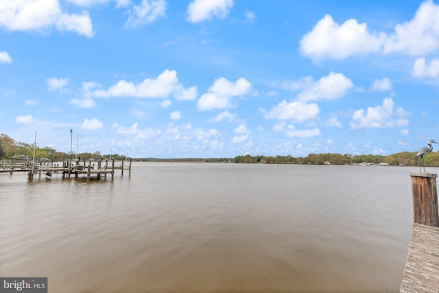 view of dock with a water view