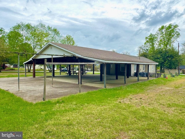 view of property's community with a lawn