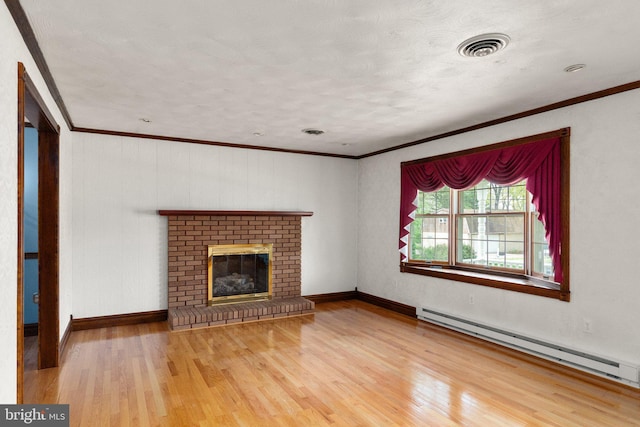 unfurnished living room with crown molding, a baseboard radiator, and wood finished floors