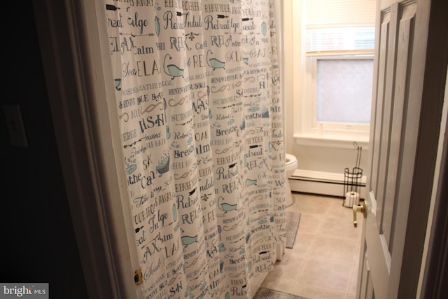 bathroom with toilet, tile patterned flooring, a baseboard radiator, and curtained shower