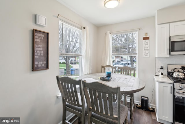 617 Franklin Ave, Cherry Hill, NJ 08002 - dining room with baseboards and dark wood-style flooring