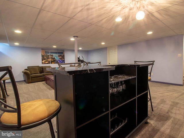 bar with recessed lighting, baseboards, bar, and carpet